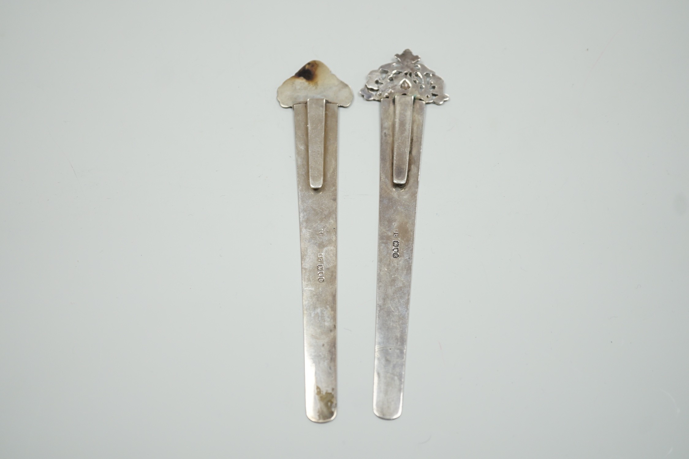 Two silver book marks by Stuart Clifford, London, 1897 and 1902, largest 17.9cm.